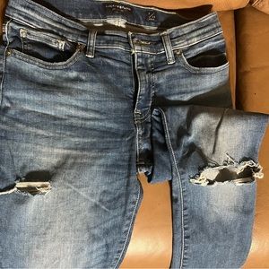 Lucky brand tears and worn areas (distressed)